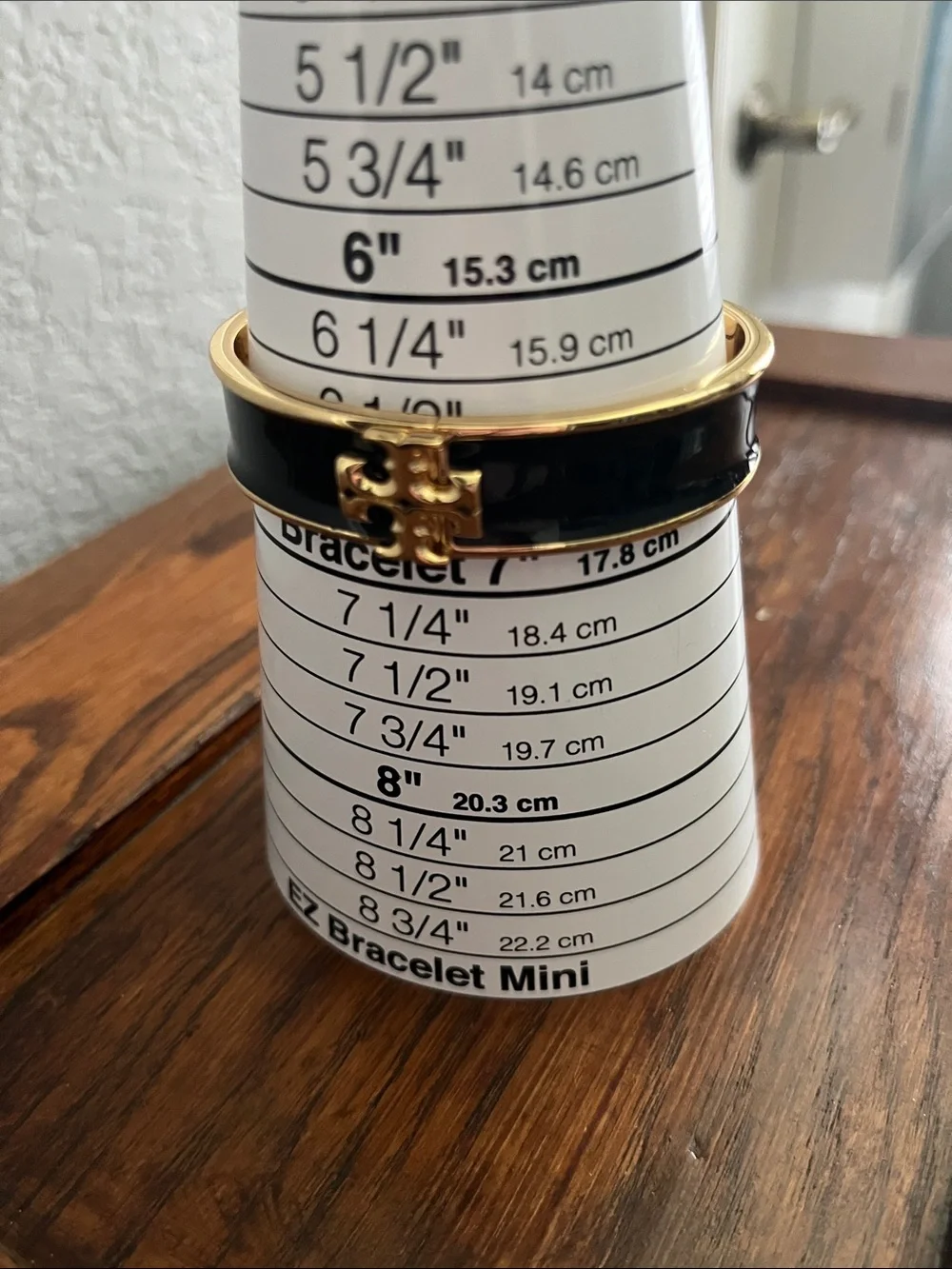 Tory Burch Black and Gold Logo Hinged Bangle